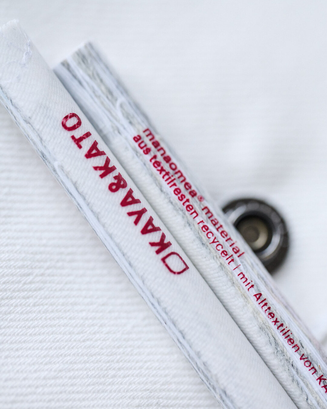 Pen made from discarded textiles as an example of downcycling.