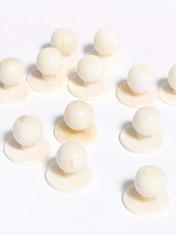 Ball buttons made of precious bone, white